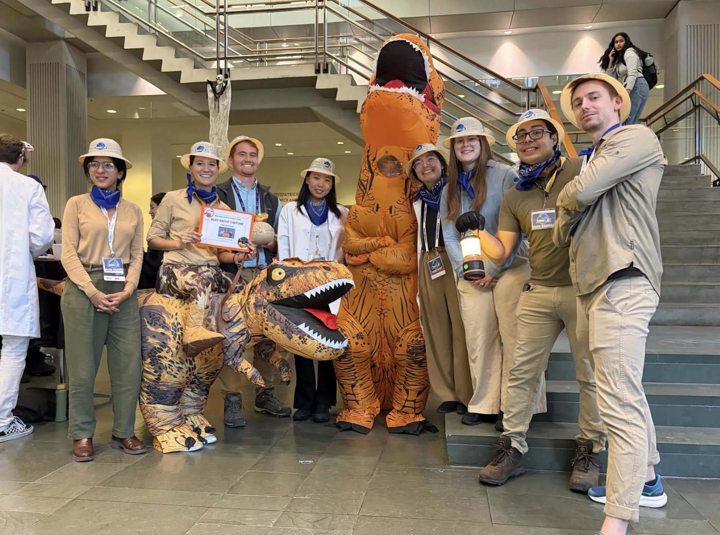 The Chory Lab in matching Jurassic Park costumes at the Duke BME Halloween party